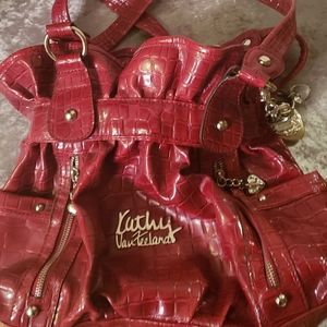 Kathy Van Zeeland red handbag